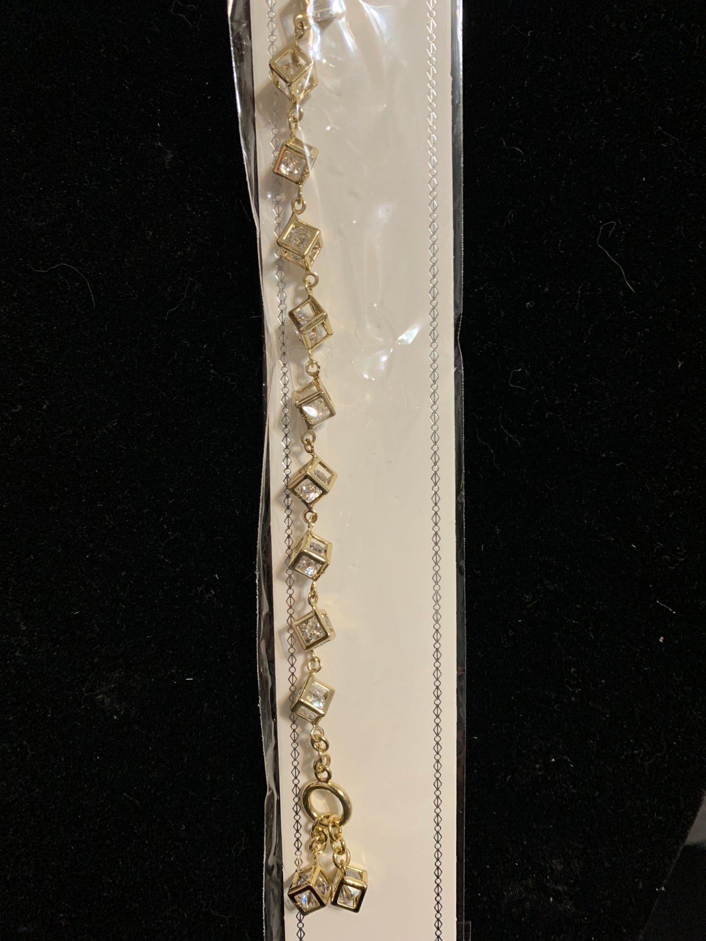 Bracelet 6” Gold Plated 14k has crystal bead inside box