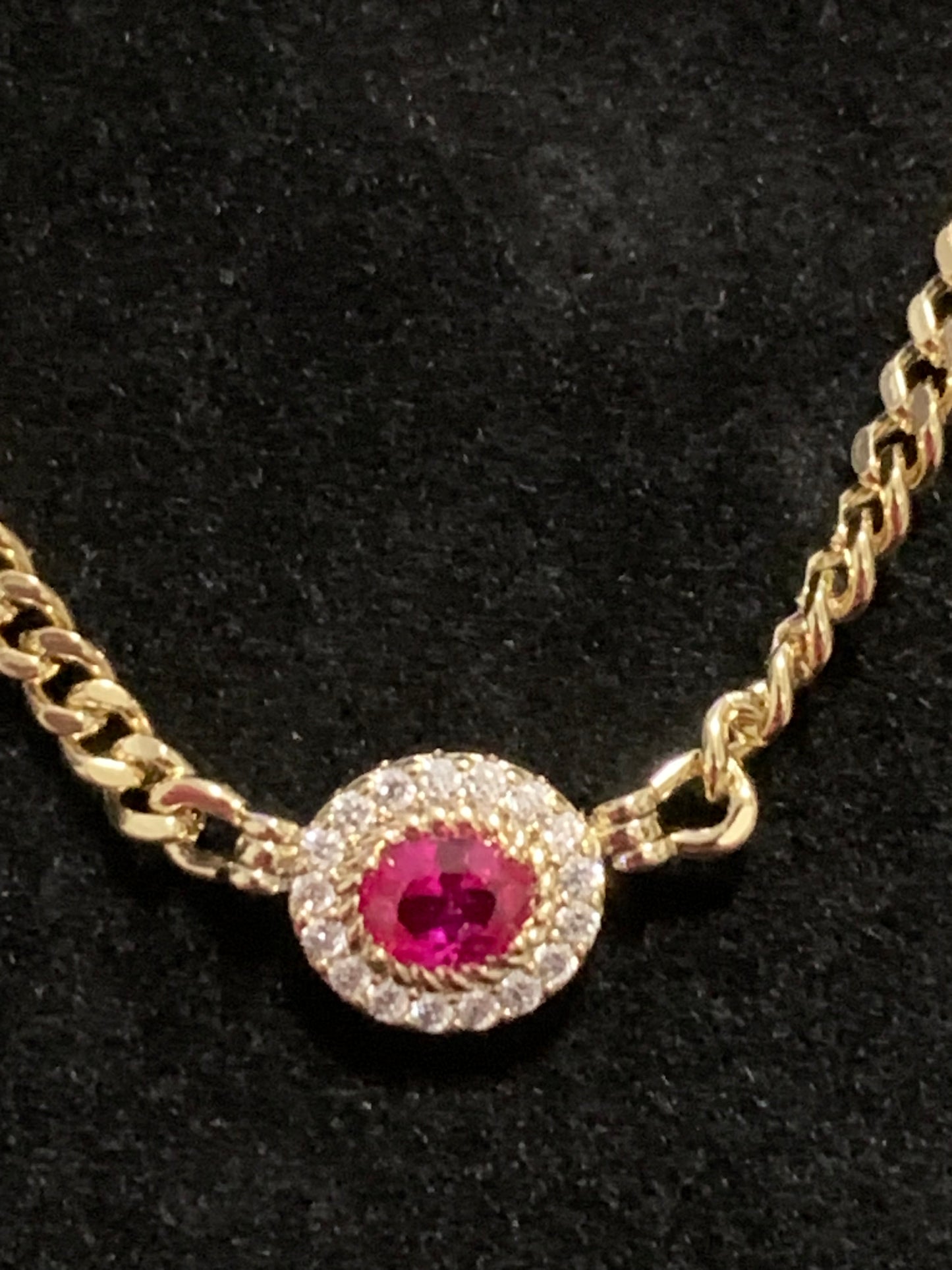 Necklace 18” Gold Plated 14k has a hot pink bead in the middle and crystals around it