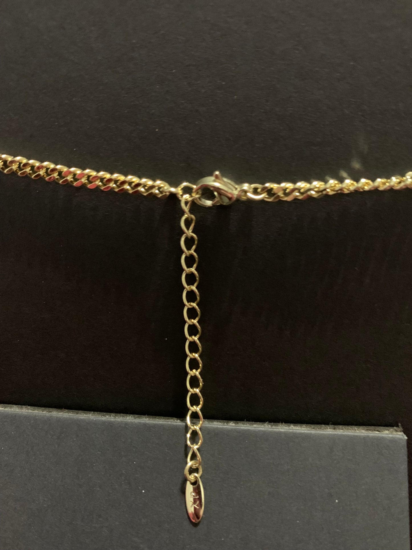 Necklace 18” Gold Plated 14k has a hot pink bead in the middle and crystals around it